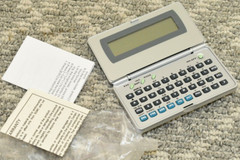 Generic Electronic Language Translator Handheld Computer – Needs New Batteries