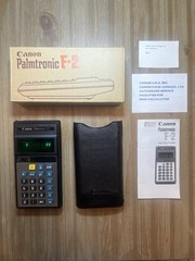 Vintage Canon Palmtronic F-2 scientific calculator w/ Box , Case and paper work