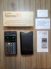 Vintage Canon Palmtronic F-2 scientific calculator w/ Box , Case and paper work