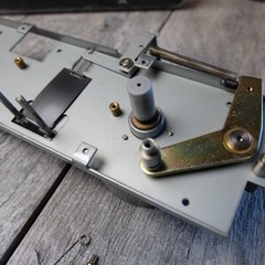 Tascam TSR-8 Reel to Reel – Transport Assembly w/ Flywheel Lift Pinch Roller Arm