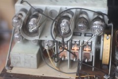 Vintage 1932 General Electric A-81 Portable Radio with tubes, missing cover.